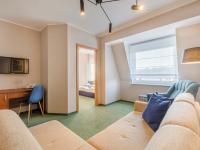 Televízia a/alebo spoločenská miestnosť v ubytovaní Villa Verdi Pleasure & Spa