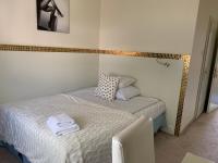Łóżko lub łóżka w pokoju w obiekcie Hotel Court Wellness&Spa