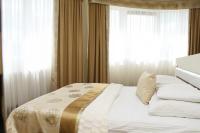 Łóżko lub łóżka w pokoju w obiekcie Hotel Court Wellness&Spa