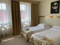 Łóżko lub łóżka w pokoju w obiekcie Hotel Court Wellness&Spa