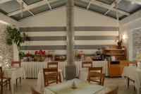 Reštaurácia alebo iné gastronomické zariadenie v ubytovaní Marie Palace