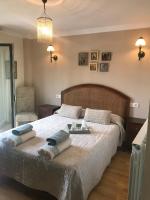 Posteľ alebo postele v izbe v ubytovaní Casa el EDEN de Cameros