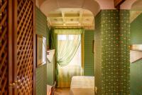 A bed or beds in a room at Hotel S. Anna