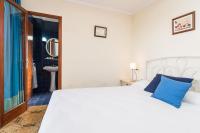 Posteľ alebo postele v izbe v ubytovaní Villa Can Salom, villa for 8 at Mal Pas Beach