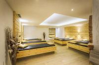 Łóżko lub łóżka w pokoju w obiekcie Hotel Barbarahof Saalbach, inkl JokerCard