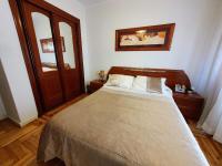 A bed or beds in a room at Casa Porto, con Garaje