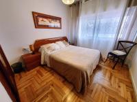 A bed or beds in a room at Casa Porto, con Garaje