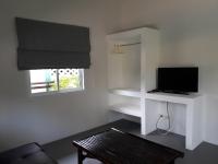 TV a/nebo společenská místnost v ubytování Sunya Cottage