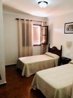 Postel nebo postele na pokoji v ubytování Hotel La Yedra