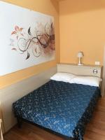 Posteľ alebo postele v izbe v ubytovaní 21 Aprile Accommodation