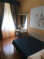 Posteľ alebo postele v izbe v ubytovaní 21 Aprile Accommodation
