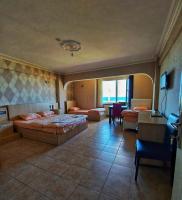 A bed or beds in a room at KILIÇ MOTEL