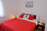 Posteľ alebo postele v izbe v ubytovaní Apartments Vila Marinela