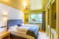Łóżko lub łóżka w pokoju w obiekcie Appartement Seefeld Tirol - Luxusappartement Birkenwald