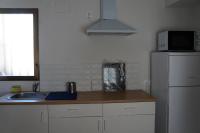 Kuchyň nebo kuchyňský kout v ubytování Apartamento Centro Pergo