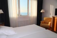 Postel nebo postele na pokoji v ubytování Hotel Gudamendi