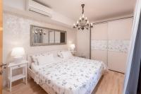 Postel nebo postele na pokoji v ubytování ISLAND HVAR LUXE Holiday Villa Maslina with Beach
