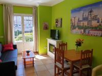 Telewizja i/lub zestaw kina domowego w obiekcie Apartamentos Dana Madrid