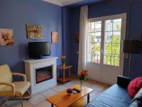 Telewizja i/lub zestaw kina domowego w obiekcie Apartamentos Dana Madrid
