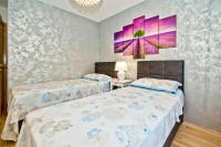 Postel nebo postele na pokoji v ubytování ISLAND HVAR LUXE Holiday Villa Maslina with Beach
