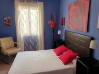 Łóżko lub łóżka w pokoju w obiekcie Apartamentos Dana Madrid