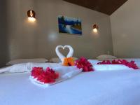 Cama ou camas em um quarto em Pousada e Restaurante Paraíso Natural