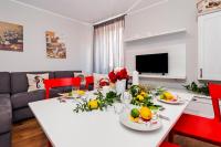 Telewizja i/lub zestaw kina domowego w obiekcie Nel Centro City Apartment