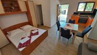 Postel nebo postele na pokoji v ubytování Apartments Gajo