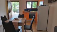 Kuchyň nebo kuchyňský kout v ubytování Apartments Gajo