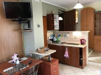 Kuchyňa alebo kuchynka v ubytovaní APARTAMENTY-STUDIO noclegi wczasy wakacje ferie - pobyty rodzinne