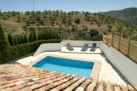 Bazén v ubytování Rural Montes Málaga: Cortijo La Palma nebo v jeho okolí