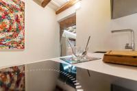 Kuchyňa alebo kuchynka v ubytovaní Largo di Torre Argentina Cozy Studio