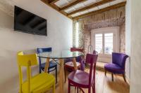 Televízia a/alebo spoločenská miestnosť v ubytovaní Largo di Torre Argentina Cozy Studio