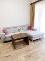 A seating area at CityApartment MONIKA