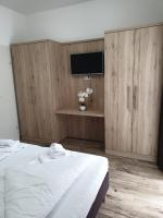 A bed or beds in a room at CityApartment MONIKA