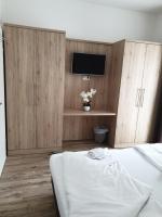 A bed or beds in a room at CityApartment MONIKA