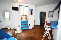 Televízia a/alebo spoločenská miestnosť v ubytovaní Apartamentos Cas Xurrac