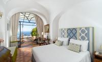 Posteľ alebo postele v izbe v ubytovaní Hotel Punta Regina