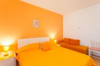 Posteľ alebo postele v izbe v ubytovaní Apartments & Rooms Alagić