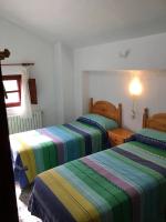 Posteľ alebo postele v izbe v ubytovaní CORTIJO VIANA LA SAGRA