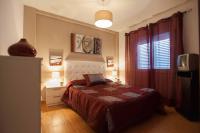 Postel nebo postele na pokoji v ubytování Livingtarifa Apartamento Los Lances