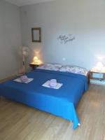 Postel nebo postele na pokoji v ubytování Apartments Vidic