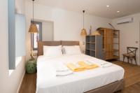 Postel nebo postele na pokoji v ubytování Pylosea Luxury Lodge