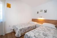 Posteľ alebo postele v izbe v ubytovaní Apartment Marul