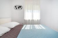 Posteľ alebo postele v izbe v ubytovaní Apartment Marul