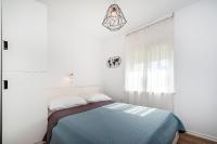 Posteľ alebo postele v izbe v ubytovaní Apartment Marul