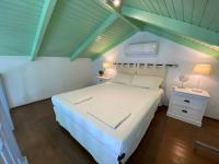 Postel nebo postele na pokoji v ubytování Thodoris Infinity View Apartments