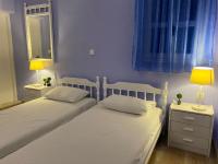 Postel nebo postele na pokoji v ubytování Thodoris Infinity View Apartments