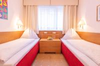 Posteľ alebo postele v izbe v ubytovaní Hotel Furian