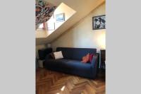 A seating area at City Center Milanese Cosy Retreat